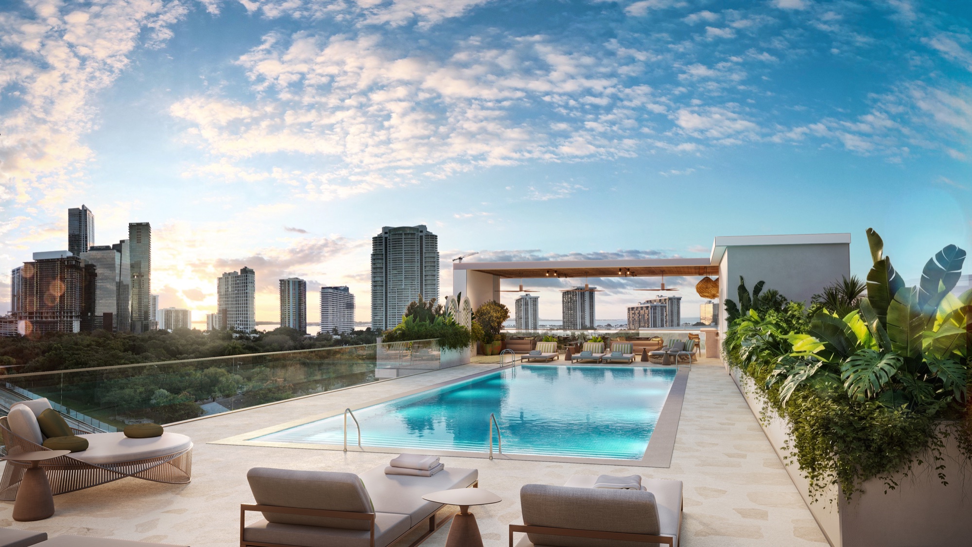 The PARKSIDE rooftop pool deck — beach-inspired with cabanas and skyline views.